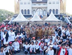 Camat Ujung Pandang Bersama Jajaran Hadiri Kirab Obor Pekan Olahraga Kota Makassar VIII 2023